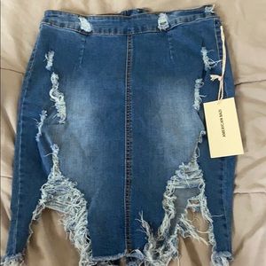 Distressed denim mini skirt